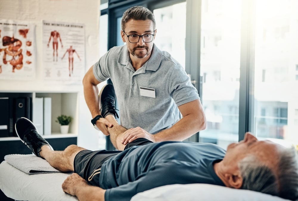 Chiropractor providing hands-on care to a patient, demonstrating personalized service and highlighting the practice’s commitment to patient well-being